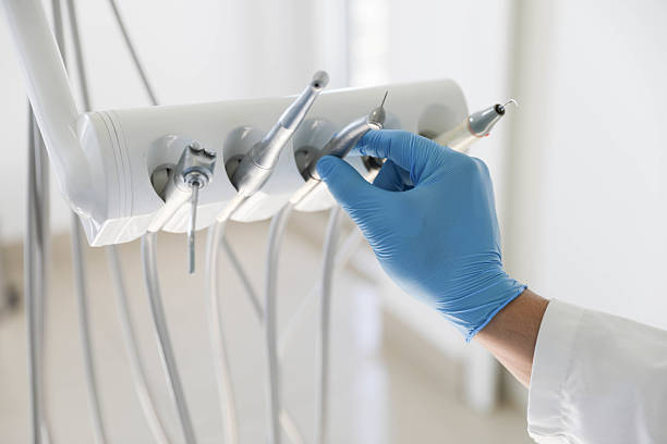 Professional Emergency Dentist technician working in Clayton, MO